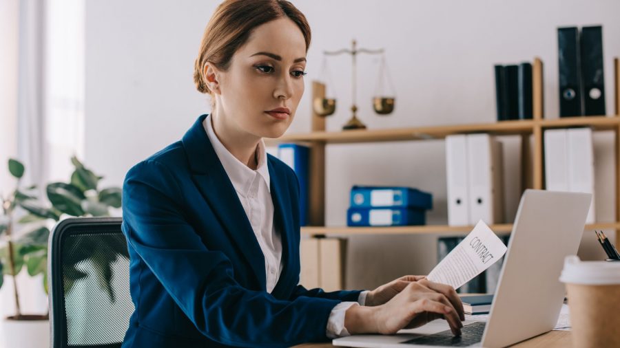 Female lawyer checking documents